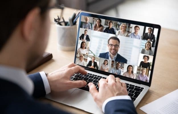 A businessman speak on web conference with diverse colleagues using laptop | Etiquette During the Conference Call | Conference Call Tips and Etiquette in 2020