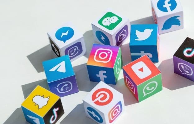 A paper cubes collection with printed logos of world famous social networks ss