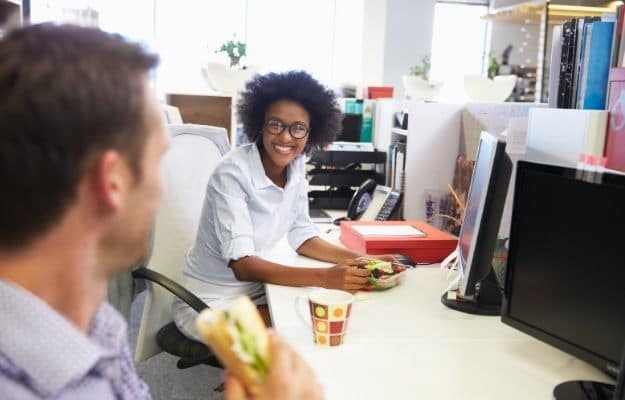 Two colleagues having a lunch break at work ss